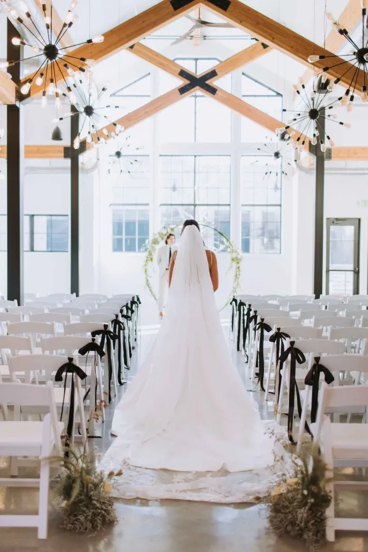 A bride at a ceremony in The Ridge at Cache Valley event space